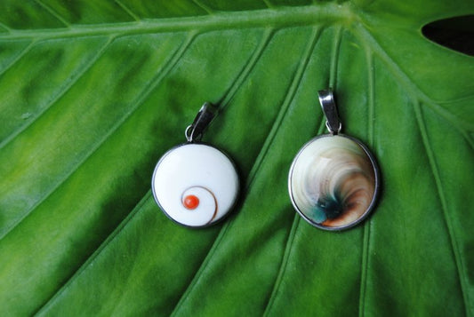 DOUBLE SIDED STERLING SILVER SHELL PENDANT WITH RED ACCENT